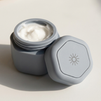 SnapPods grey capsule open filled with cream close-up